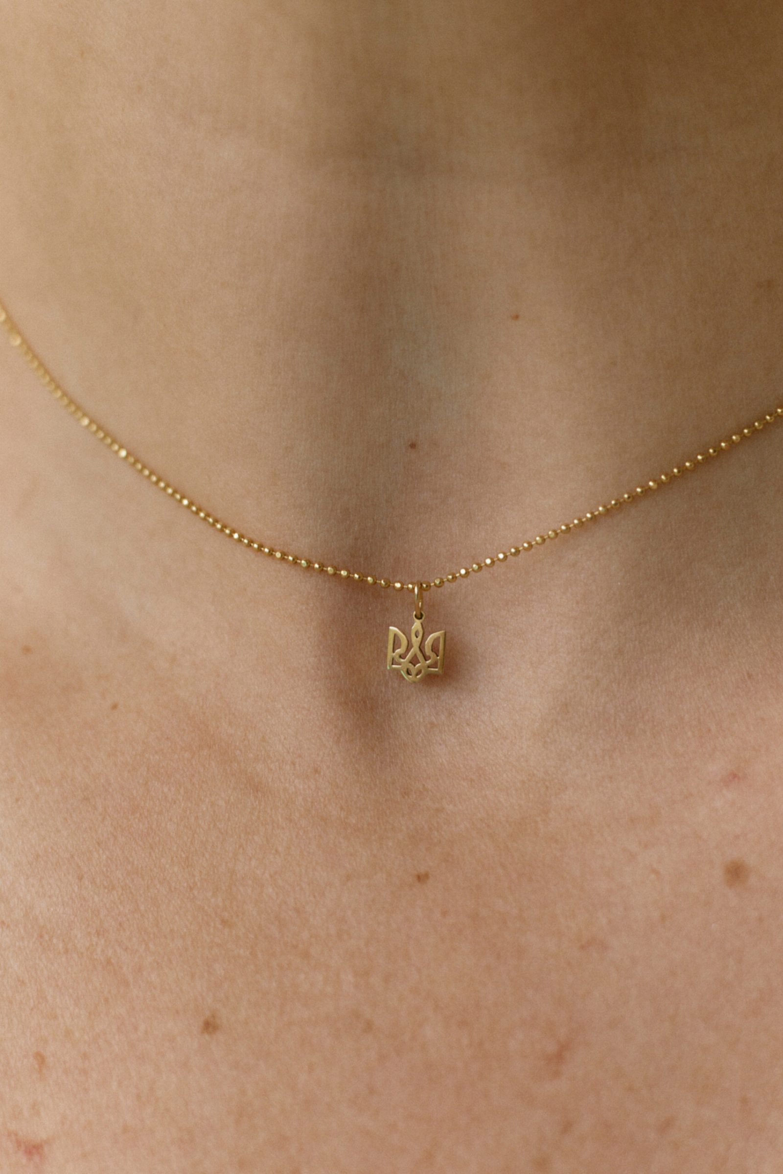 Тризуб на тілі: Guzema Fine Jewelry
